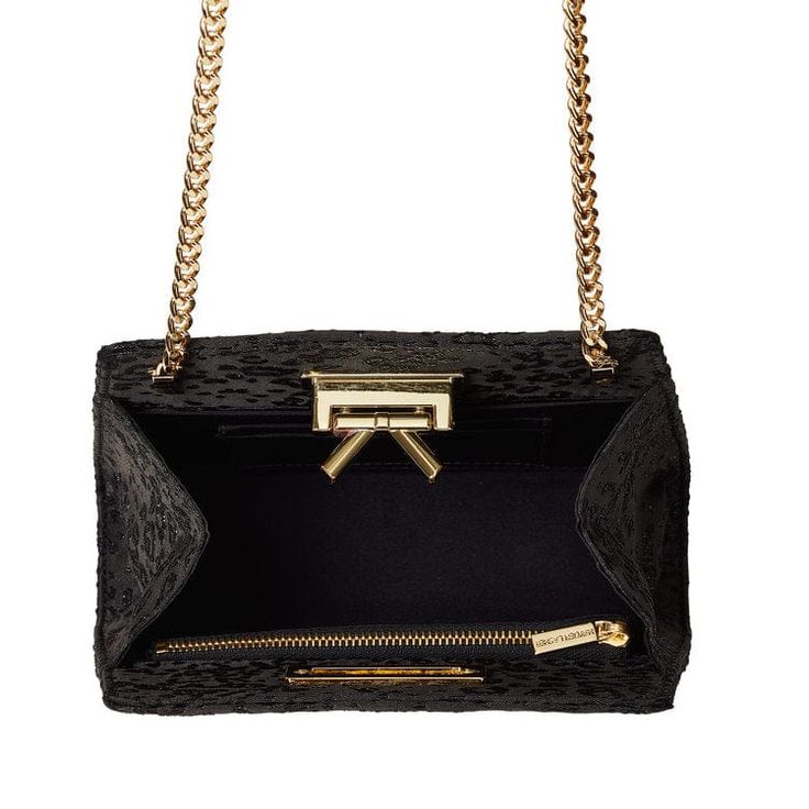 Handmade in New York, the Grace bag is crafted of black satin with a black and silver embroidery. Features a signature bow detail and gold hardware closure. Luxury Rectangular Evening Shoulder Bag, Luxury Leather Shoulder Bag For Events, Luxury Crossbody Evening Bag For Events, Luxury Evening Bag With Gold-tone Hardware For Gala, Luxury Gold-tone Evening Bag For Gala, Top Handle Evening Bag With Dust Bag Included, Top Handle Evening Bag With Dust Bag, Designer Evening Bags With Detachable Strap, Designer Leather Bags For Events