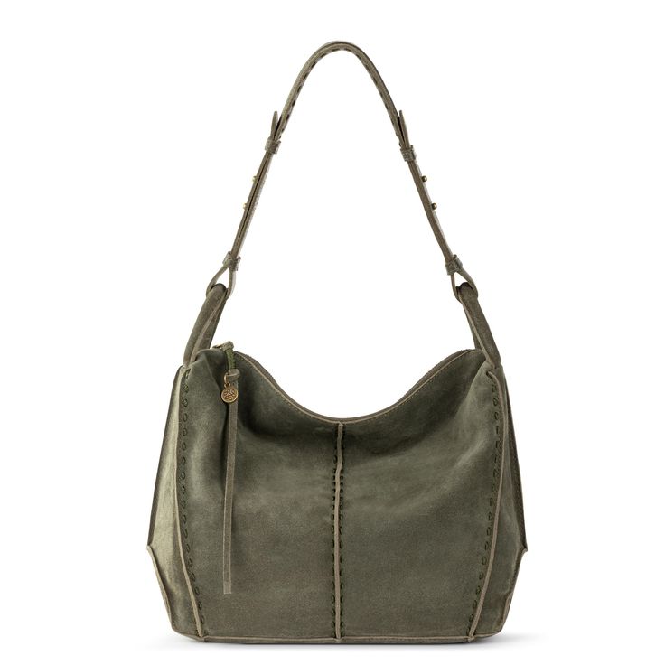 Timeless, roomy and durable, the Los Feliz Hobo is crafted from premium leather responsibly sourced from Leather Working Group gold-medal-certified tanneries. Fitted with  REPREVE® lining and kitted with myriad pockets, this slouchy work-to-weekend style will quickly become your go-to handbag. Exterior: Leather Interior: Repreve Lining Antique silver tone hardware Main zipper closure Back zipper pocket Interior contains back wall slip pocket, zipper pocket and two front wall multi-functional pockets Single adjustable strap Premium leather from a Leather Working Group Gold-rated certified tannery, REPREVE lining made from recycled materials including plastic bottles Casual Textured Leather Hobo Bag For On-the-go, Casual Textured Leather Hobo Bag, Rectangular Textured Leather Hobo Bag For Travel, Casual Textured Leather Bag For On-the-go, Versatile Leather Hobo Bag With Leather Handles, Casual Textured Leather Hobo Bag For Everyday Use, Casual Textured Leather Shoulder Bag For On-the-go, Versatile Textured Leather Hobo Bag For Errands, Casual Textured Leather Hobo Bag Tote