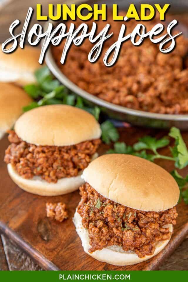 two sloppy joe sandwiches on a cutting board with the words lunch lady sloppy joes