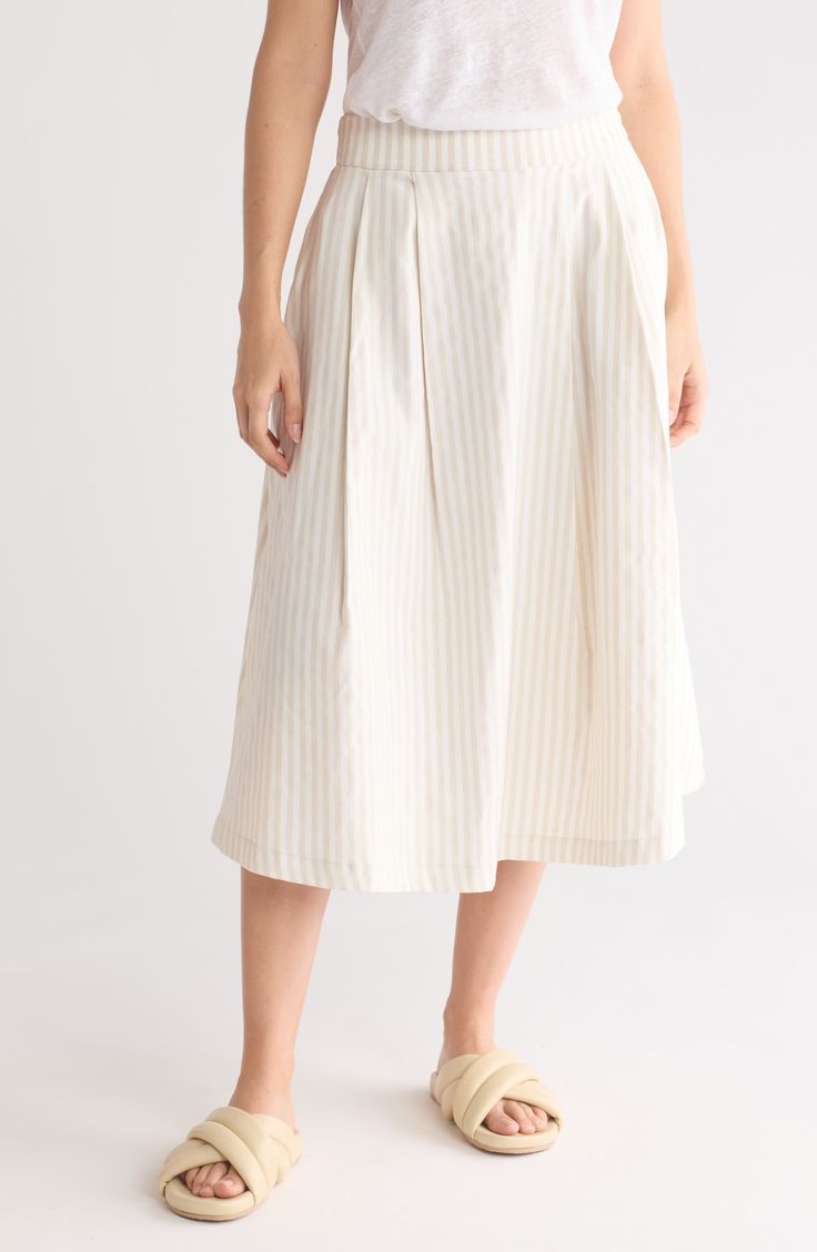 Soft stripes enliven this lightweight skirt designed in a flared silhouette. 30" length Side-seam pockets 76% rayon, 21% nylon, 3% spandex Machine wash, line dry Made in the USA of imported fabric Beige Midi Maxi Skirt, Beige Flowy Maxi Skirt Midi Length, Beige Lined Skirt For Spring, Cotton A-line Bottoms For Day Out, Beige Flowy Midi-length Pleated Skirt, Beige Flowy Midi-length Skirt, Beige Lined Maxi Skirt For Day Out, Flowy Beige Pleated Midi Skirt, Spring Beige Voluminous Skirt