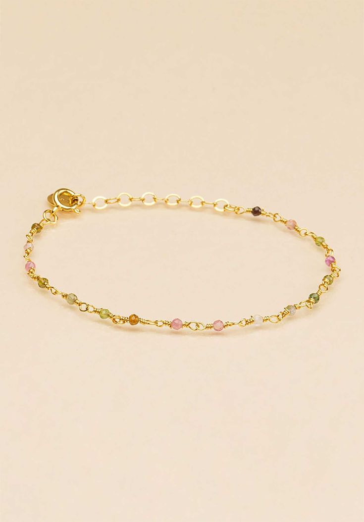 Vibrant in colour, this Tourmaline Beaded Gold Plated Bracelet from UNE A UNE is crafted from tourmaline beads colours and separated by gold-plated chain. It is finished with a logo-engraved charm and can be easily adjusted for the perfect fit. Slip it on and stack it high. It Is Finished, Gold Plated Bracelet, Tourmaline Beads, Gold Plated Bracelets, Tourmaline, Perfect Fit, Gold Plate, Plating, Bracelet