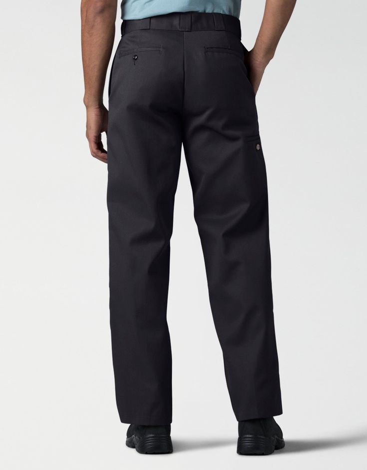 Any job is easier with Dickies’ Loose Fit Double Knee Work Pants, that work with you at a great value. Your knees don’t need back-up for blow outs because there’s a fabric reinforcement that keeps you covered. These work pants have a roomy fit in the seat and thigh that makes bending and kneeling more comfortable, while the polyester/cotton blend spells durability at a value. Multi-use pockets on the leg and back are a nice supplement to the heavy-duty belt loops that hold even the heaviest tool Black Utility Pants With Welt Pockets, Black Utility Bottoms With Welt Pockets, Relaxed Fit Work Pants With Standard Cut Leg, Classic Black Cargo Pants With Belt Loops, Classic Solid Work Pants With Side Pockets, Solid Flat Front Work Pants With Belt Loops, Black Chinos With Pockets For Work, Work Pants With Belt Loops And Flat Front, Classic Black Pants With Hip Pockets