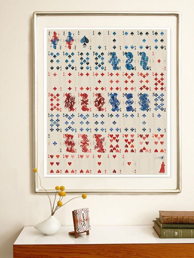 a cross stitch pattern hanging on the wall