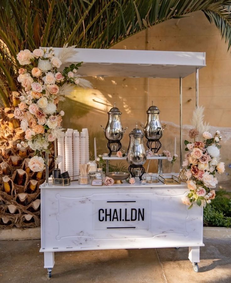 a table with candles and flowers on it