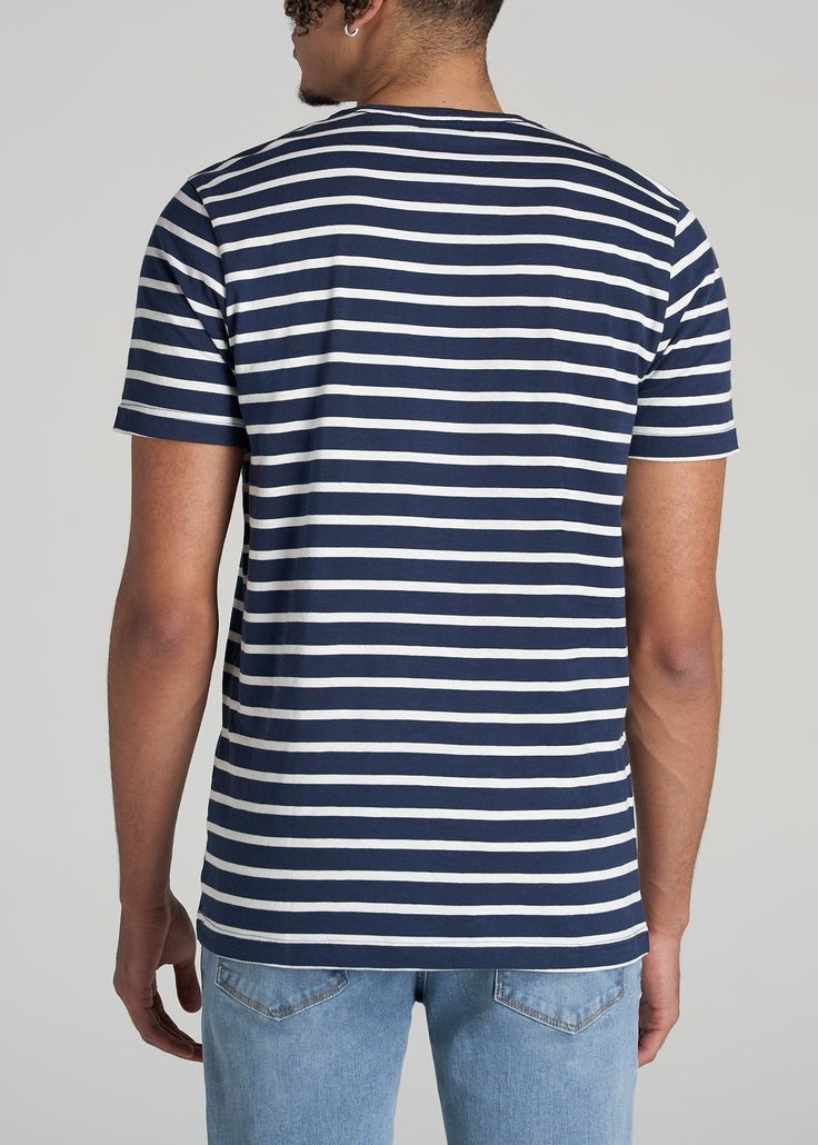 About Our Men’s Tall T-Shirt This striped tall tee will become your new go-to, whether you’re headed on a first date, meeting friends for drinks or enjoying a lazy weekend at home. We know the struggles of finding tall size t-shirts, which is why we set out to design the ultimate collection for guys 6’3” to 7’1”. This tee was crafted with your height in mind featuring proper proportions at every seam from the short sleeves that aren’t too short for your long arms to the hip length that you’ll ne Lazy Weekend, Meeting Friends, Meet Friends, Striped T Shirt, American Shirts, First Date, Striped Tee, Too Short, Navy White