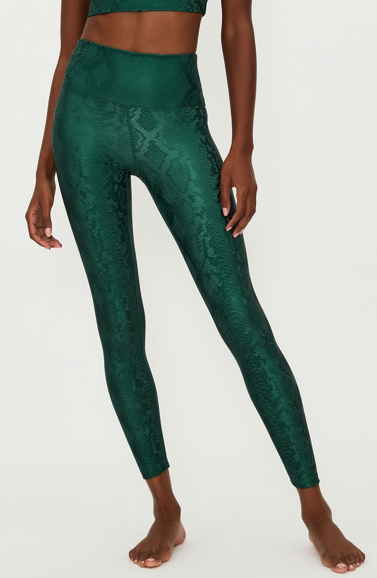 A shiny animal print details these soft and stretchy leggings topped with a high waist. Pull-on style 95% polyester, 5% spandex Machine wash, dry flat Imported Lepord Print Workout Leggings, Snake Print Leggings, Leopard Workout Leggings, Spring Tie-dye Stretch Leggings, Fitted Multicolor Graphic Print Leggings, Beach Riot, Stretchy Leggings, On Beach, Tops For Leggings