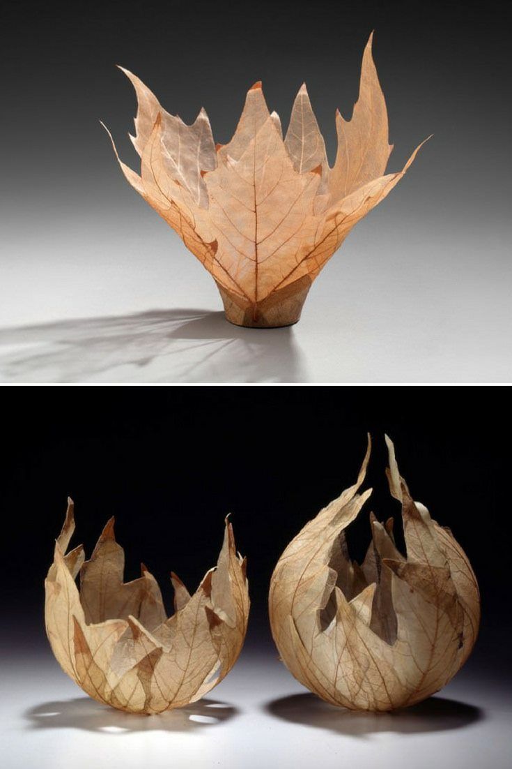 two pictures of an object made out of wood and one has a leaf on it