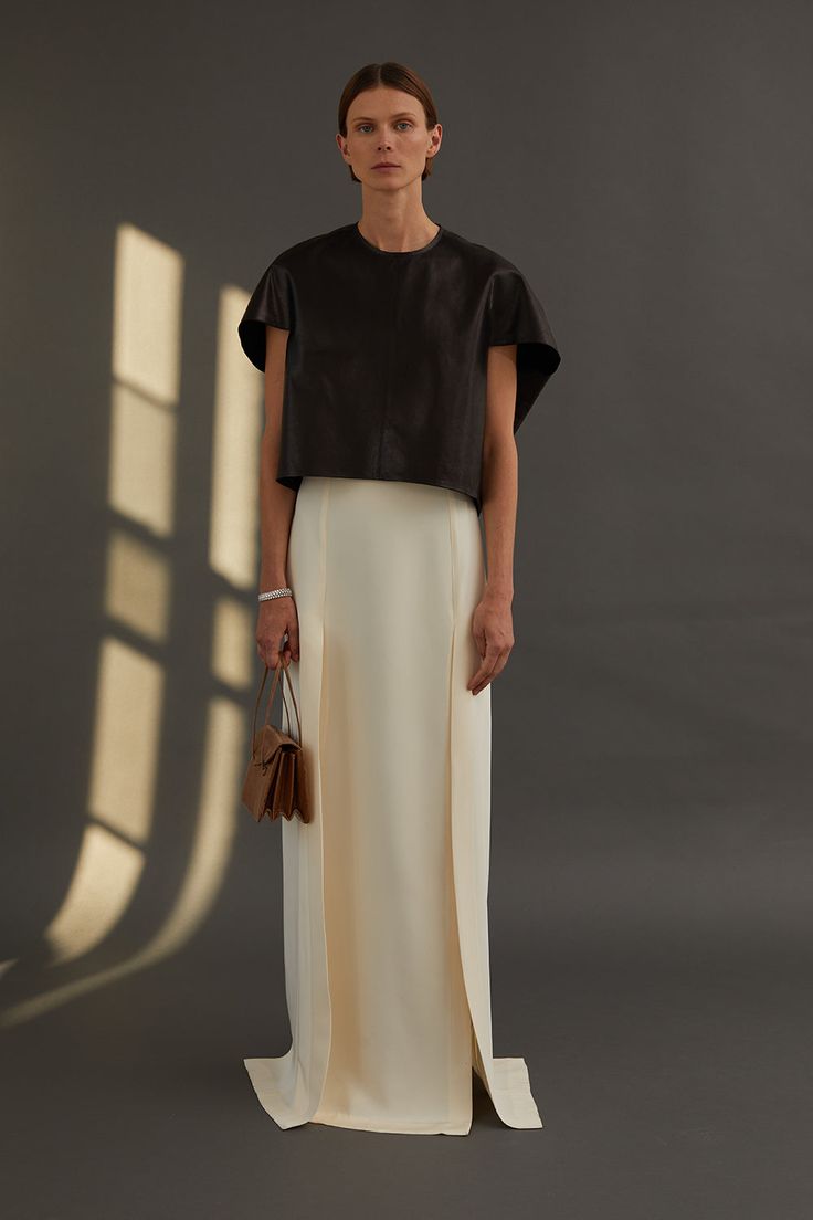 Four panel, silk crepe de chine maxi skirt with vented slits. Elegant column, designed to open with movement as you walk. Wear it with Iris Top in Crème or Iris top in Leather. Petal Sleeves, Conservative Outfits, Maxi Skirt Style, Silk Maxi Skirt, White Maxi Skirts, Crepe Skirts, Tailored Coat, Black Iris, Petal Sleeve