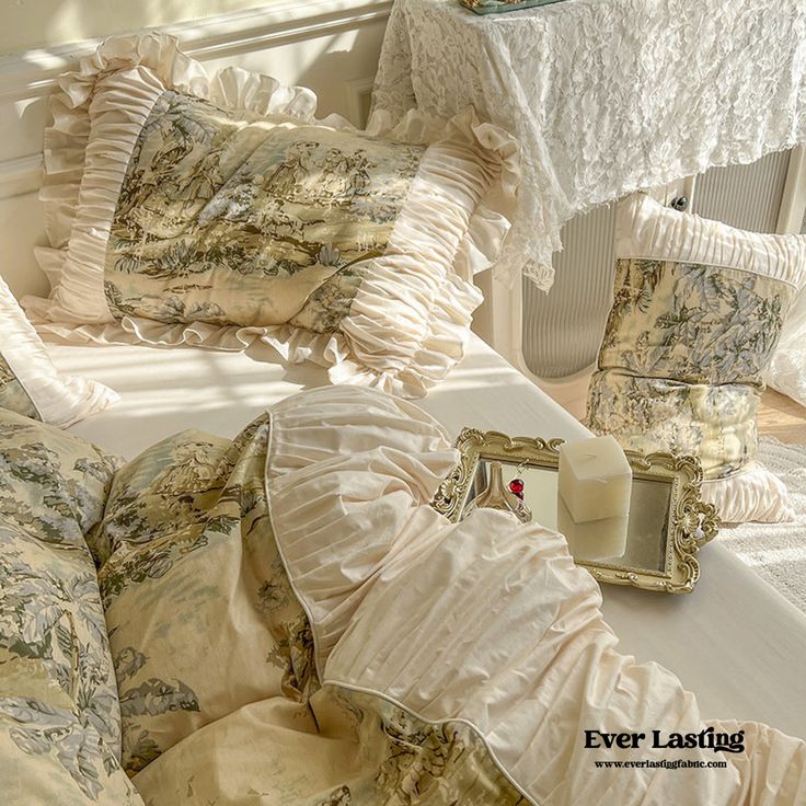 the bed is covered with ruffled sheets and pillows, along with an old fashioned mirror