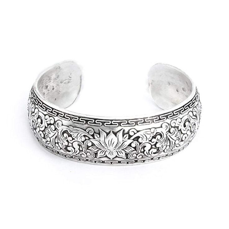 This wide carved design lotus Bali cuff bracelet features a lovely two-tone pattern of floral and vines for a fabulous addition to your outfit. Lotus Bracelet, Modern Silver Jewelry, Bali Jewelry, Solitaire Diamond Pendant, Exotic Jewelry, Metal Cuff Bracelet, Bali Silver, Hinged Bracelet, Silver Jewelry Handmade