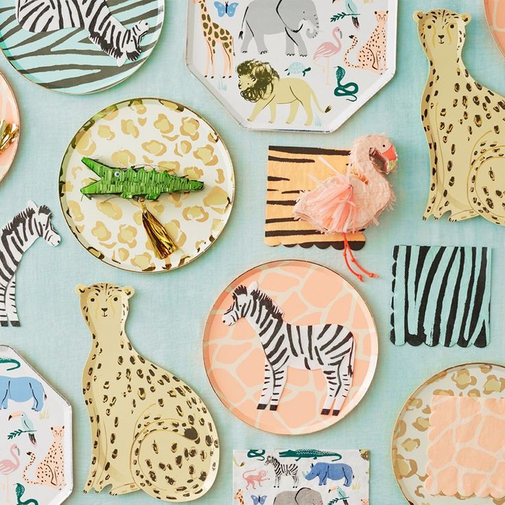 several plates with animals and zebras on them are arranged in the shape of hexagonal shapes