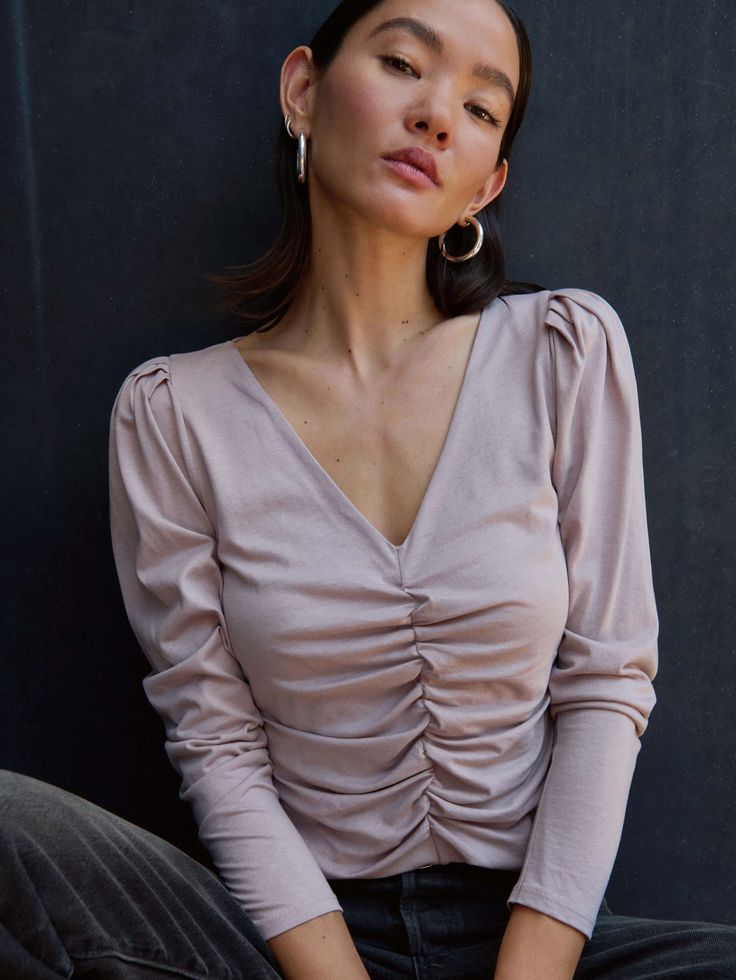 A flattering shirred-all-over V-neck long sleeve with shoulder pads for a subtle puff? Yes, please. (This one comes in Whisper.) | Angelina Top in Whisper | Ethical Essentials Rails Clothing, Edwin Jeans, Nation Ltd, Retro Brand, Favorite Daughter, Mother Denim, Yes Please, New Tops, Romper Pants