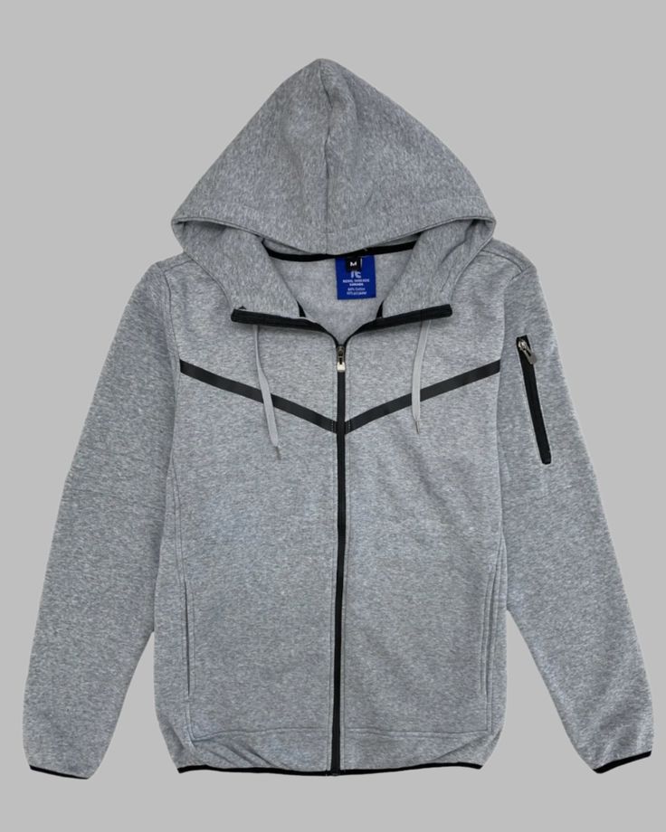 This Men's Solid tech fleece hoodie is perfect for spring. Keep yourself warm and stylish with its tech fleece material. No need to sacrifice comfort for fashion with this hoodie. Get ready to turn heads with this must-have addition to your wardrobe. Features: Full zip up Solid Fleece hoodie with 2 side pockets and 1 extra functional zippered pocket on arm Standard size fit 60% Cotton 40% Polyester Gray Fleece Hoodie For Gym, Moisture-wicking Fleece Hooded Hoodie, Functional Fleece Hoodie With Hood, Functional Athletic Heather Hoodie For Streetwear, Functional Streetwear Hoodie In Athletic Heather, Moisture-wicking Fleece Hoodie, Functional Gray Fleece Hoodie, Moisture-wicking Fleece Hooded Jacket, Functional Hooded Fleece Sweatshirt