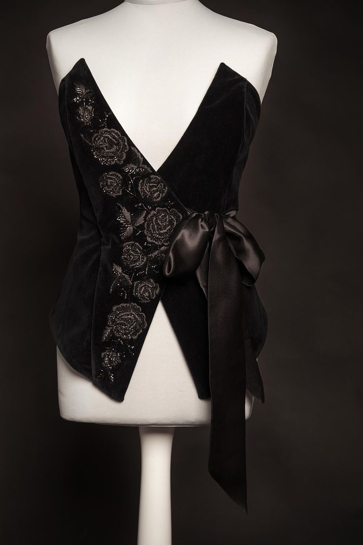 This exquisite corset  is made from cotton velvet and decorate with hand embroidery - Black on black. The front part is Black color cotton velvet  , the inside is black soft silk.    The corset is decorated with hand embroidery - impeccable silk threads, beads, sequins.   Corset is fixed around the waist on hooks and decorated with a beautiful bow. This belt will accentuate the waist and create a flattering feminine shape. On the waist 67-70 cm   Other dimensions per order. Add this fashionable Corset With Dress, Rpg Clothes, Modern Corset, Teresa Teng, Velvet Corset, Black Corset, Black On Black, Cotton Velvet, Cabaret