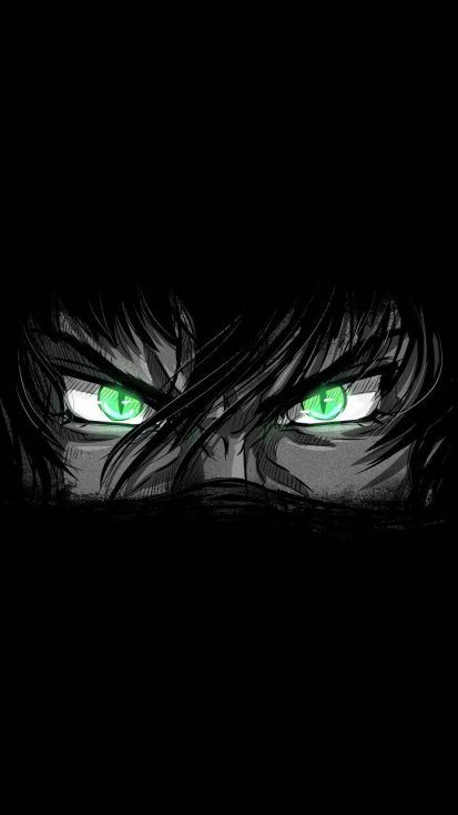 an evil looking person with green eyes in the dark