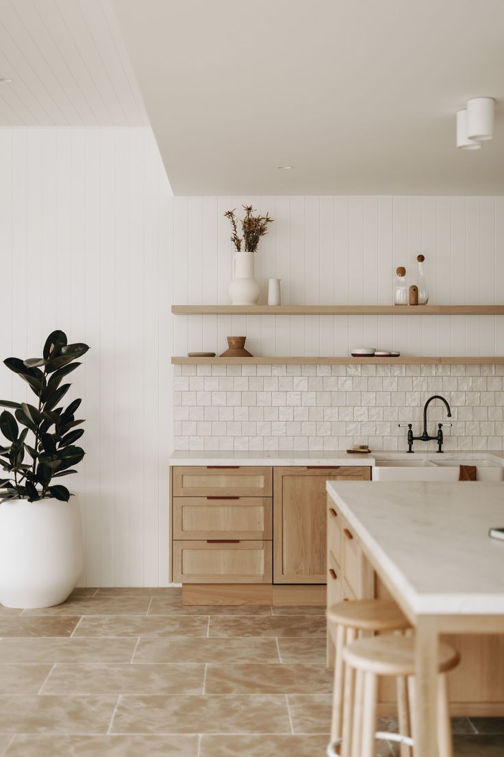 the kitchen is clean and ready for us to use it's natural wood accents