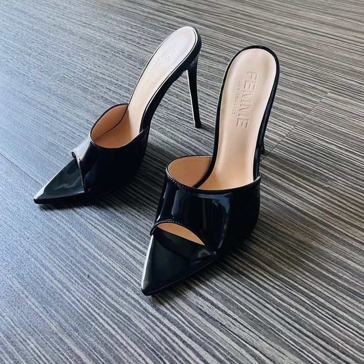 The Gianni Leather Mule By Femme La Goes With Just About Everything. So Chic And Versatile You Can Wear This To Work, Play Or A Night Out On The Town. This 4.5-Inch Heel Is Made Of Vegan Leather, Is Cruelty-Free, And Is Handmade In Los Angeles. Recommended To Size Up. Patent Leather Slip-on Heels For Party, Evening Slip-on Patent Leather Heels, Classic Slip-on Mules For Party, Chic Patent Leather Mules With 4-inch Heel, Luxury Black Mules With Wrapped Heel, Sleek Black Slip-on Mules, Elegant Patent Leather Mules With 4-inch Heel, Elegant Open Heel Mules, Elegant Almond Toe Mules For Party