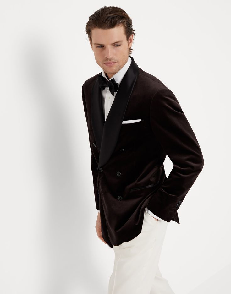 Cotton Prince of Wales velvet one-and-a-half breasted tuxedo jacket with shawl lapels The Prince of Wales pattern enlivens the smooth, shimmering surface of velvet, updating the timeless style of this tuxedo jacket in a balance between modern touches with vintage influences. The glossy silk detailed on the shawl lapel and the pocket trim adds a sophisticated texture contrast. Close fitting through the chest with slightly pronounced shoulders, the construction of the one-and-a-half-breasted jacke Luxury Double-breasted Tuxedo With Hidden Buttons, Luxury Double-breasted Formal Suit, Classic Formal Tuxedo With Double Button Closure, Luxury Tuxedo With Double Button Closure And Lapel Collar, Winter Tuxedo Double Breasted Suit With Double Button Closure, Elegant Double-breasted Formal Suits, Formal Three-piece Suit With Double Button And Lapel Collar, Luxury Double-breasted Formal Blazer, Luxury Double Breasted Long Sleeve Evening Suit