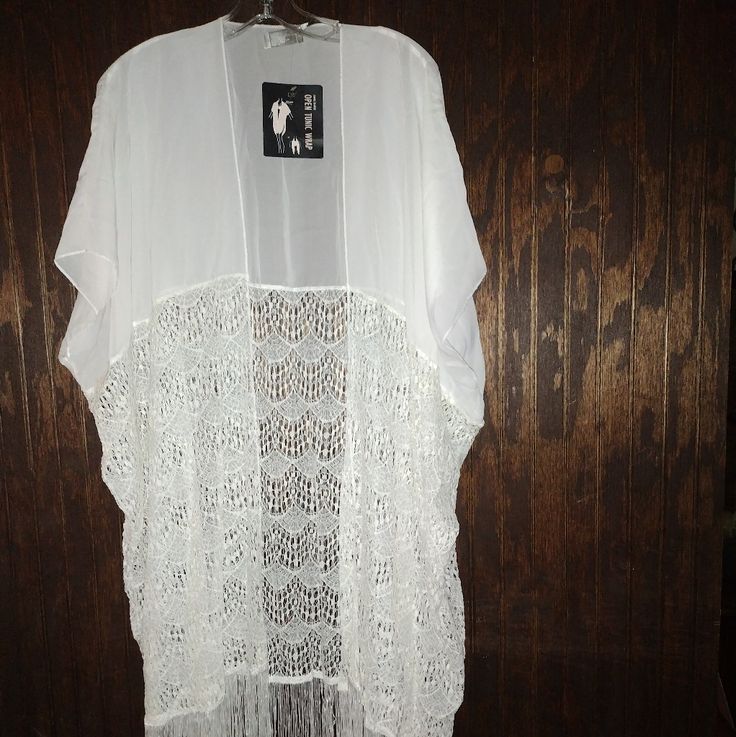 Brand: D&Y Size: One Size S-Xl Color: White Sleeveless Tunic Blouse, Fringed Hem, Sleeveless. Two Ways To Wear It. Brand New With Tags Flawless Condition. Comes Washed And Sanitized From A Clean Non-Smoking House. Bundle And Save In Shipping Chic White Stretch Cover-up, White Stretch Spring Cover-up, White Stretch Cover-up For Spring, White One Size Open Front Cover-up, Spring Day Out Cover-up With Lace Trim, Spring Day Out Lace Trim Cover-up, Casual Lace Trim Cover-up, Spring Lace Trim Cover-up For Day Out, Lace Tops For Summer Beach Cover-up