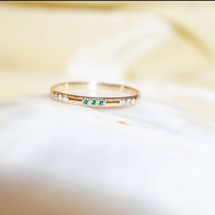 "Materials Gold, Rose gold, White gold Gemstone: Natural Emerald and diamond 14k Gold Art Deco Emerald And Diamond Ring / Wedding Ring / Stackable Emerald Ring / Diamond Stacking Ring / Solid Gold Ring / Wedding Ring Item Details ✔ Made to Order ✔ Gold Kt: 14K (also available in 18K) ✔ Available Gold Color: Rose Gold, Yellow Gold, White Gold ✔ Total Diamond ctw: 0.06 Ctw ✔ Total emerald ctw: 0.03 Ctw ✔ Diamond Color-Clarity: j Color SI Clarity ✔ Width of Band: 1.4MM ✔ Ready to Ship in 7-10 Busin Gold Emerald Half Eternity Jewelry, Gold Half Eternity Jewelry For May Birthstone, Gold Jewelry With Half Eternity For May Birthstone, Gold Jewelry For May Birthstone With Half Eternity, Gold Emerald Stackable Wedding Rings, Gold Emerald Ring With Half Eternity Round Cut, Gold Emerald Stackable Rings For Wedding, Rose Gold Gemstone Stackable Anniversary Rings, Rose Gold Diamond Ring For May Birthstone