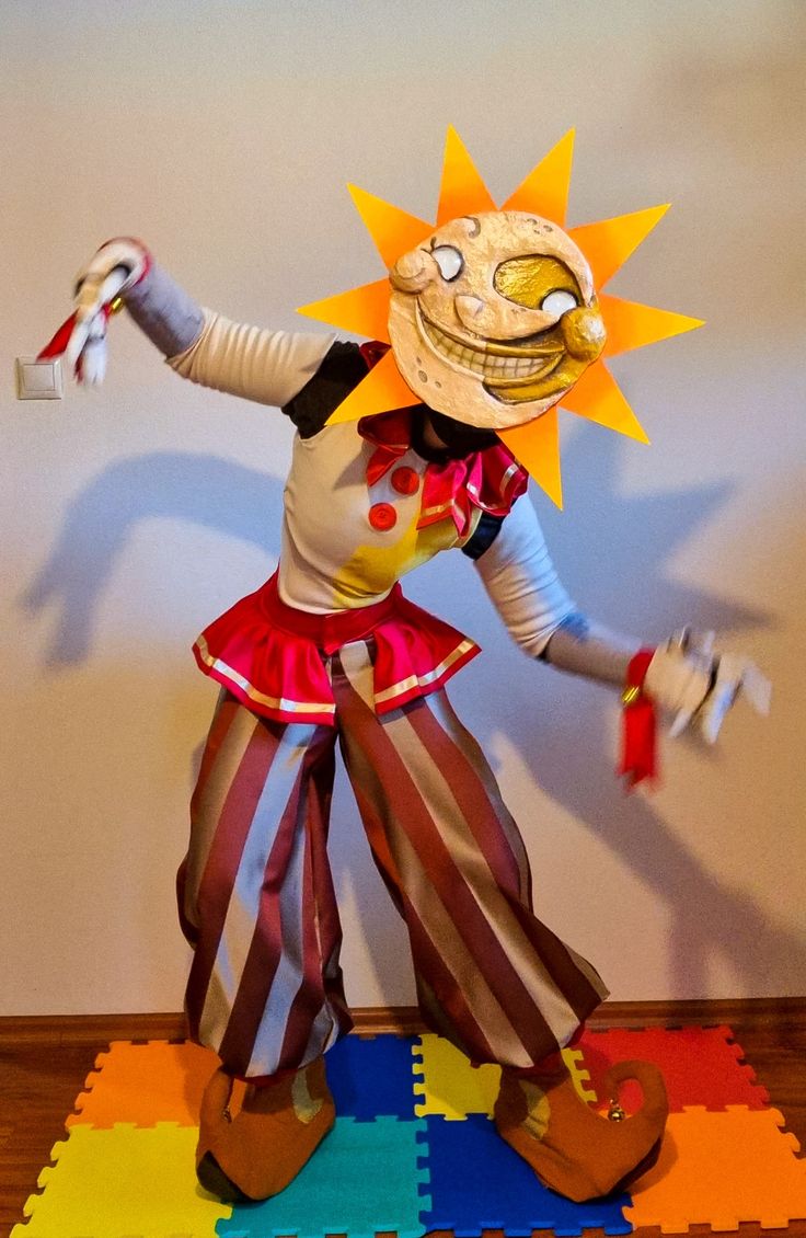 a person dressed as a clown standing on top of a rug