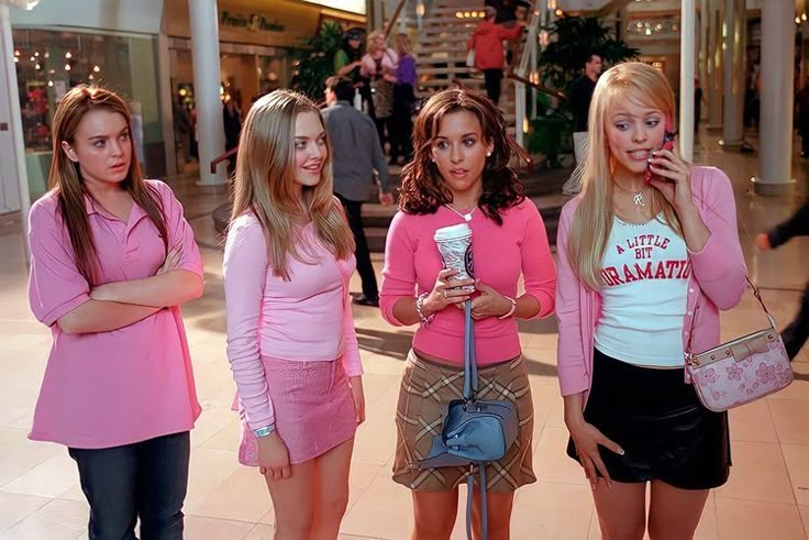 the mean girls are talking on their cell phones in this scene from mean girl gang