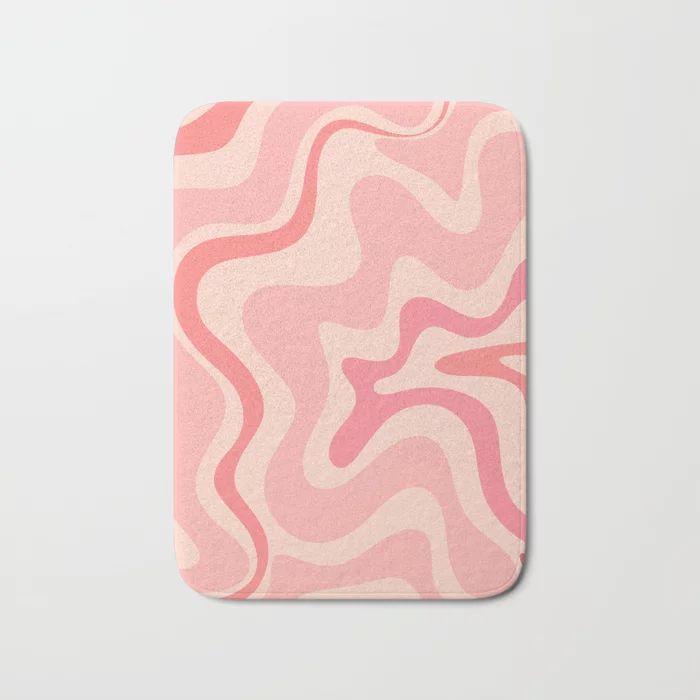 a pink and white abstract design on a square coaster