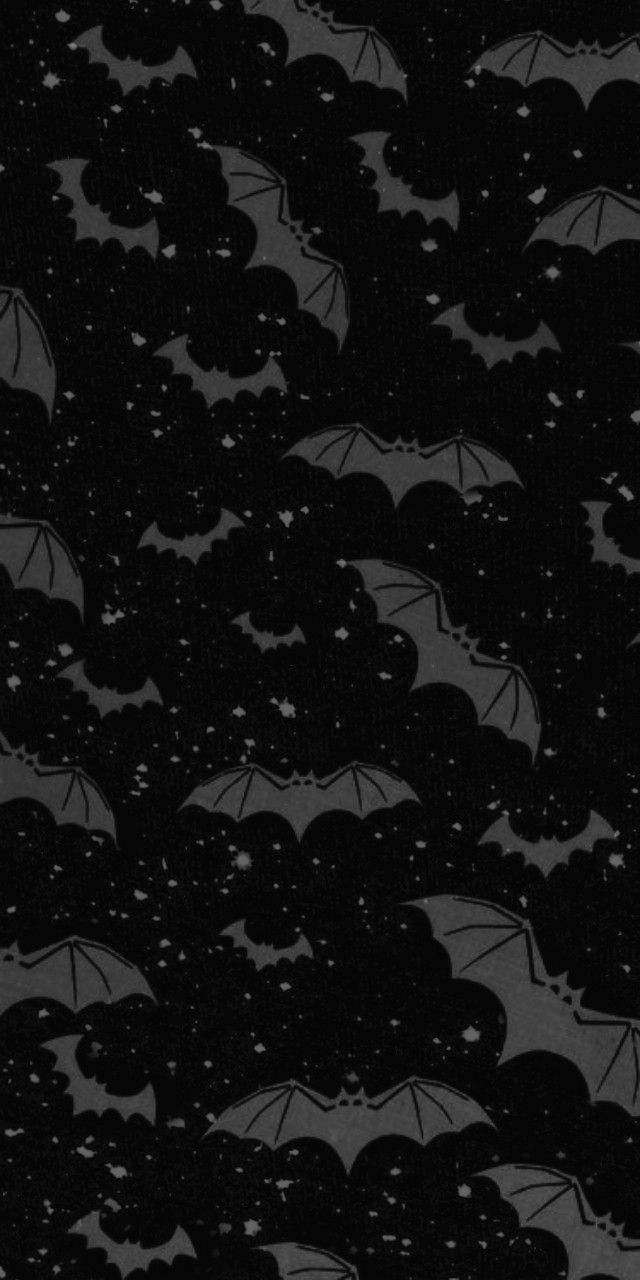 black and white image of bats flying in the night sky with stars all over them