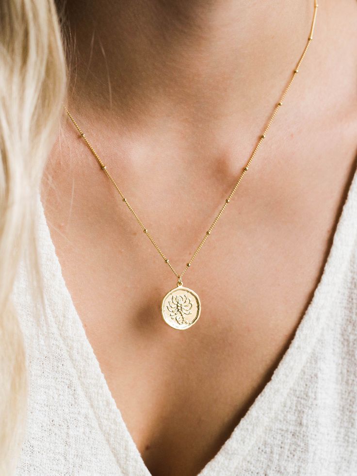 Our gold zodiac coin necklace might be our new favorite necklace. 14k gold filled - perfect for everyday wear. Get your own sign, or wear your loved one's sign!   Find dainty necklaces, hoop earrings, dainty gold stacking rings, and more at Simple & Dainty! Zodiac Sign Medallion Necklaces For Gifts, Zodiac Sign Medallion Necklace For Gifting, Zodiac Sign Medallion Jewelry Gift, Zodiac Sign Medallion Necklace Gift, Dainty Zodiac Sign Necklace For Gift, Medallion Zodiac Sign Necklace For Gifts, Minimalist Zodiac Sign Necklace Gift, Zodiac Sign Round Pendant Coin Necklace As Gift, Yellow Gold Zodiac Sign Coin Necklace As Gift