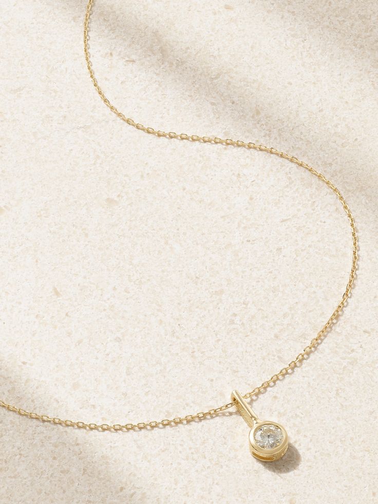 When it comes to elegant, timeless jewelry, Mateo is the name to know. This necklace has been handcrafted in New York City from 14-karat gold and bezel-set with a single sparkling diamond. The adjustable 16-inch chain makes it the perfect layering piece. Timeless 14k Gold Solitaire Necklace For Anniversary, Gift Yellow Gold Solitaire Necklace With Bezel Setting, Gold 14k Diamond Necklace With Single Diamond, Sterling Silver Solitaire Necklace In Gold With Brilliant Cut, Timeless Round Necklace With Rose Cut Diamonds, Gold Diamond Necklace With Single Diamond, Gold Solitaire Necklace With Brilliant Cut, Yellow Gold Solitaire Necklace With Bezel Setting, Delicate Cubic Zirconia Necklace With Bezel Setting