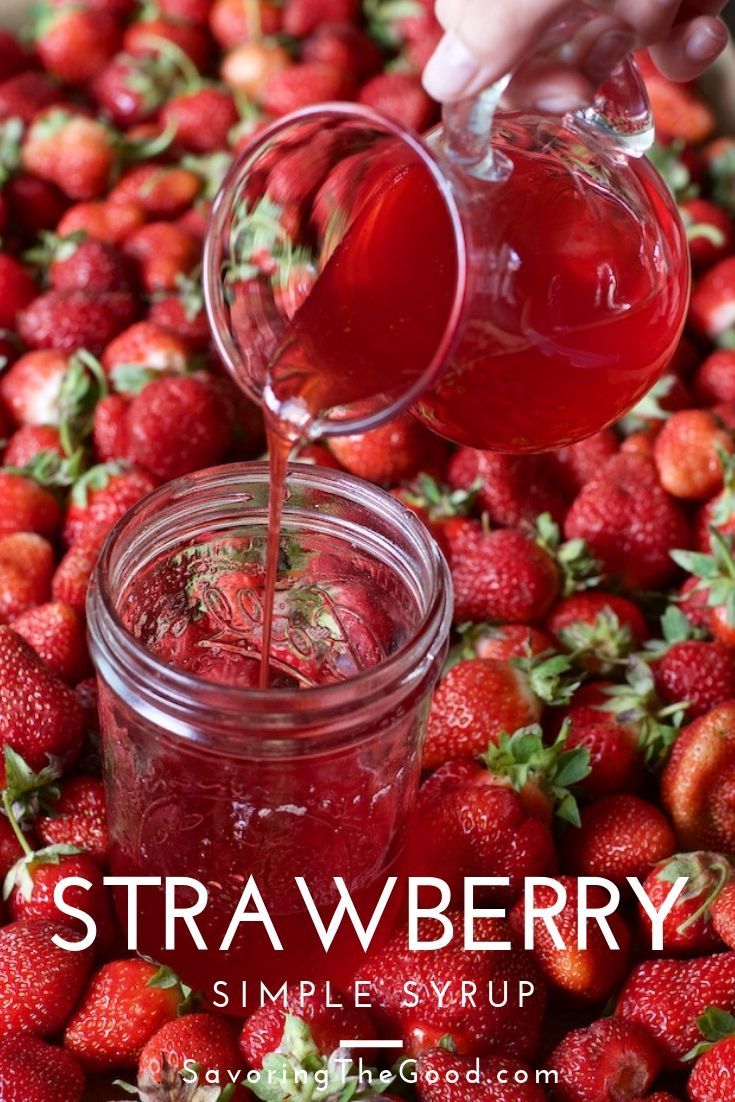 strawberries are being poured into a jar with the words strawberry simple syrup on it