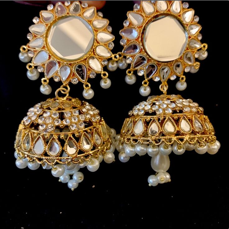 Beautiful Gold Mirror Chandelier Statement Earrings! South Asian Ethnic Jhoomka Earrings Gorgeous Statement Earrings Intricate Detail Mirror Accents Pearl Center Dangle New Without Tags See Photos For Details Bundle Or Offer For A Discount Elegant White Hoop Earrings For Festivals, White Chandelier Earrings For Festival, White Bohemian Jewelry For Diwali, Festive Bohemian White Jewelry, Festive White Bohemian Jewelry, Elegant Dangle Jhumkas For Festivals, Heavy White Chandelier Earrings For Festive Occasions, White Chandbali Earrings For Party, White Drop Chandbalis For Party