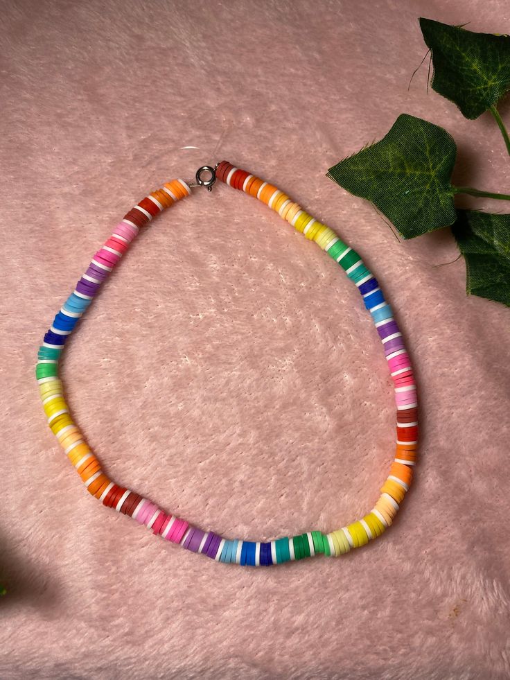 Colorful rainbow hand made necklace Fun Colorful Necklaces For Gifts, Trendy Handmade Multicolor Beaded Necklaces, Trendy Multicolor Handmade Beaded Necklaces, Casual Multicolor Necklaces For Gifts, Fun Multicolor Jewelry For Crafting, Colorful Fun Necklaces For Gifts, Fun Rainbow Jewelry For Festivals, Multicolor Necklace 16 Inch Length For Gift, Casual Rainbow Jewelry For Festivals