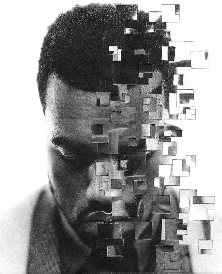 a black and white photo of a man's face with squares on his head