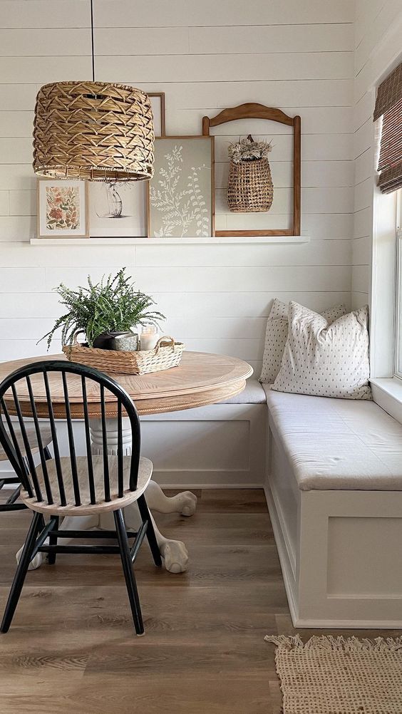 a dining room with a bench and table