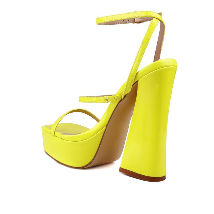 Vegan leather upper with man made sole Ankle buckle closure Heel measures approx. 5.5" H Platform measures approx. 1.5" H Imported Gorgeous Leather, White Turquoise, Neon Yellow, Black Pumps, Platform Heels, Shoe Box, The Office, Classic Black, Ankle Strap