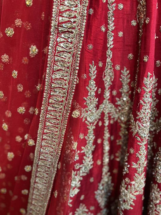 Go all out in this whimsical lehenga, studded with precious mirror, pearl, stone, embroidery work, which is sure to bring out the innate grace and grandeur in you! Color - Crimson Red Fabric & Work Style - - Silk blouse: mirror, pearl, stone, embroidery work. - Soft net lehenga: mirror, pearl, stone, embroidery work. - Soft net dupatta: embroidery work. Details - - Assured quality - Wash care instruction: Dry clean only. - Slight variation in color is possible due to digital photography. Indian Bridal Couture, Dupatta Embroidery, Stone Embroidery, Fabric Work, Indian Bridal Lehenga, Lehenga Wedding, Net Lehenga, Pearl Stone, Indian Groom