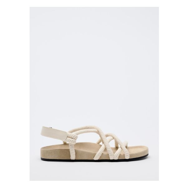 Flat sandals with rope details. Fastens with ankle strap. Rounded toe. Sole height: 0.4 inches (1 cm) Casual Beach Sandals With Rope Detail, Beige Ankle Strap Slingback Sandals For Beach, Beige Slingback Sandals For Beach With Single Toe Strap, Beige Slingback Sandals With Single Toe Strap For Beach, Summer Beige Sandals With Adjustable Strap, Beige Slingback Sandals With Textured Footbed For Beach, Casual Cream Slingback Sandals For Beach, Cream Sandals With Single Toe Strap For Vacation, Cream Single Toe Strap Sandals For Beach