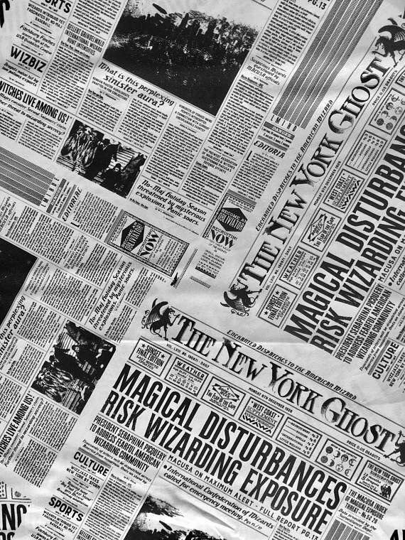 newspapers are stacked on top of each other with black and white images in them,