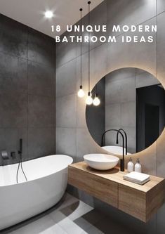 a bathroom with a bathtub, sink and round mirror in it's center