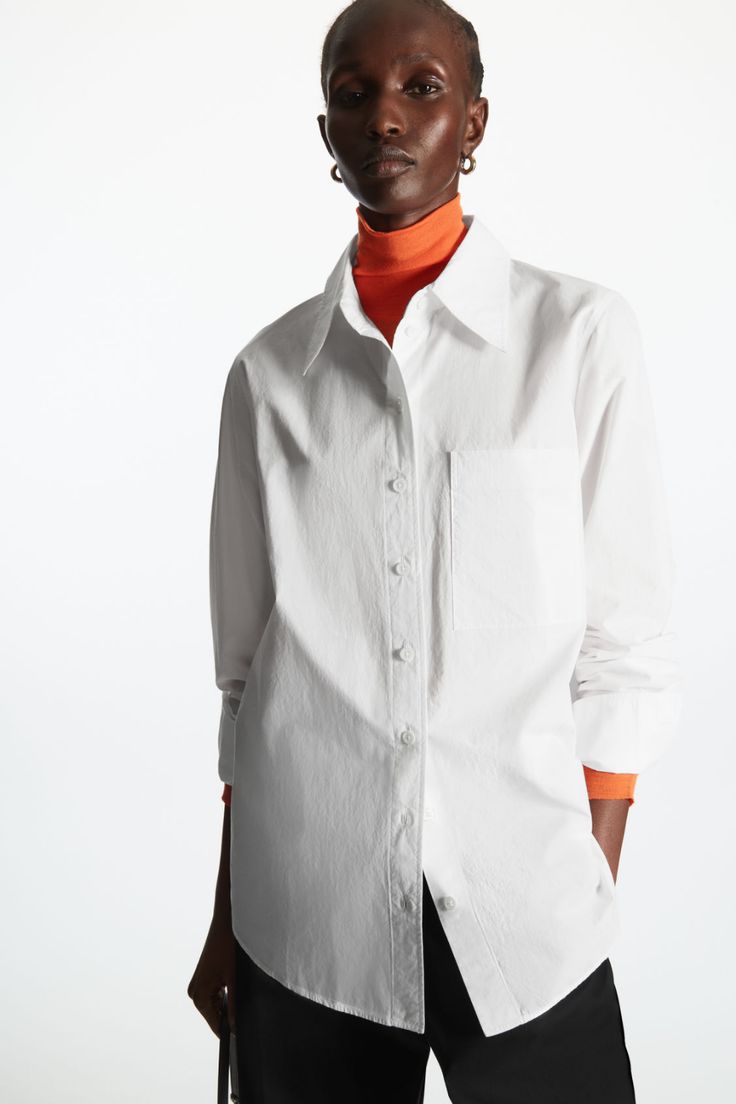 OVERSIZED LONG-SLEEVE SHIRT - WHITE - COS White Long Sleeve Shirt With Buttoned Pockets, White Oversized Shirt With Lapel Collar, White Shirt With Rolled Sleeves And Spread Collar, Classic White Shirt With Buttoned Pockets, Relaxed Fit Dress Shirt With Pockets For Work, White Shirt With Button Cuffs And Shirttail Hem, White Blouse With Buttoned Pockets For Work, White Workwear Shirt With Pockets, White Buttoned Pockets Shirt For Work