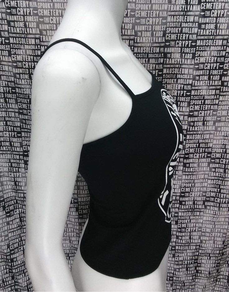 This is a black CRASS crop tank top with spaghetti straps. This has a CRASS image screen printed on the front. 57% cotton/ 38% polyester/ 5% Spandex These are handmade screenprinted and slightly vary from the photo. Please feel free to email me any questions. Thanks for looking. Due to an influx of incorrect addresses if a package is returned, you must pay the shipping cost to resend the item to you. I do not do exchanges and I do not take returns unless the item is damaged. I thoroughly check e Summer Club Tank Top With Built-in Bra, Y2k Fitted Camisole With Spaghetti Straps, Y2k Stretch Scoop Neck Crop Top, Fitted Y2k Camisole Crop Top, Y2k Club Tank Top, Fitted Tank Top For Club, Y2k Tops With Built-in Bra And Tank Straps, Fitted Sleeveless Crop Top For Streetwear, Fitted Casual Tank Top For Streetwear