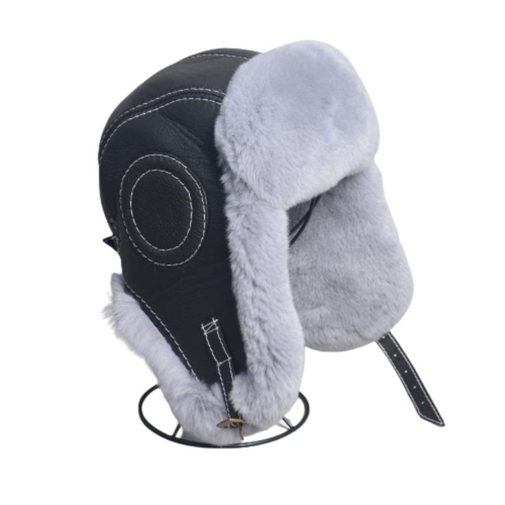 This Faux Fur Lined Leather Aviator Hat, an aviator-style hat combines a sleek leather exterior with soft faux fur lining for warmth and comfort. Ideal for cold weather, it features adjustable straps and a classic design that is both functional and fashionable. Great for outdoor activities or adding a vintage flair to your winter wardrobe. Key Features: Material: Durable leather outer shell with faux fur lining Design: Classic aviator style with flaps and adjustable straps Adjustable Fit: Strap Leather Windproof Hats For Outdoor Use, Winter Windproof Leather Hat, Adjustable Faux Fur Winter Hat, Leather Winter Hat With Short Brim, Winter Leather Windproof Hat, Winter Faux Fur Hat With Adjustable Fit, Black Aviator Hat For Outdoor, Winter Aviator Hat With Plush Lining, Adjustable Hats With Faux Fur Trim For Cold Weather