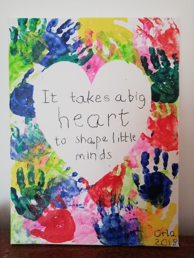 a handprinted heart with the words it takes a big heart to shape little minds