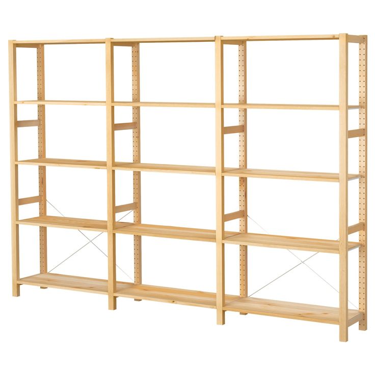 a wooden shelving unit with four shelves on one side and three rows on the other