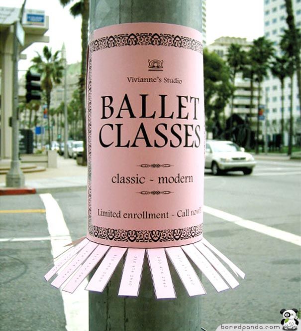 a close up of a street pole with a sign on it that says ballet classes