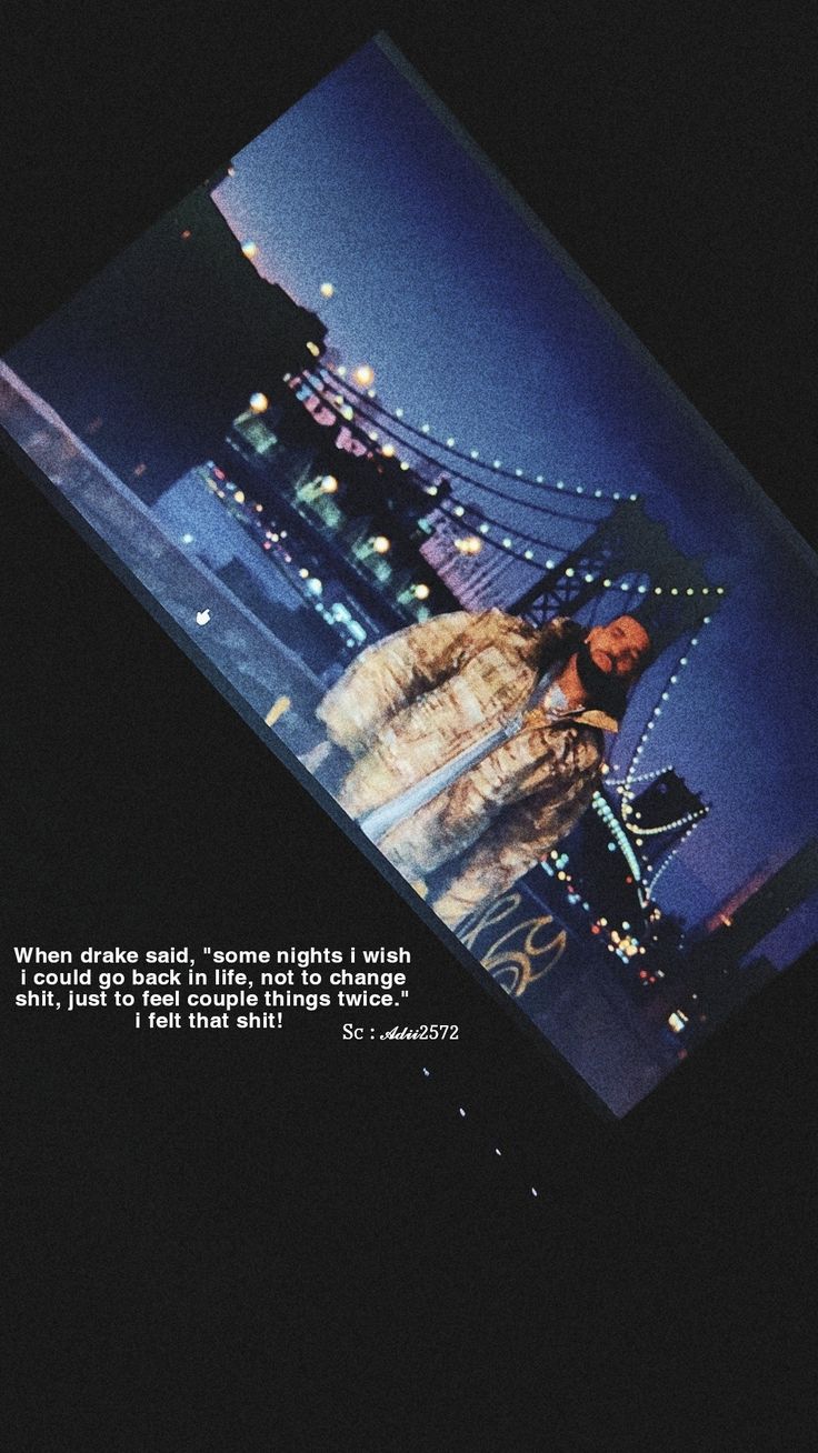 a person standing in front of a cityscape with a quote written on it