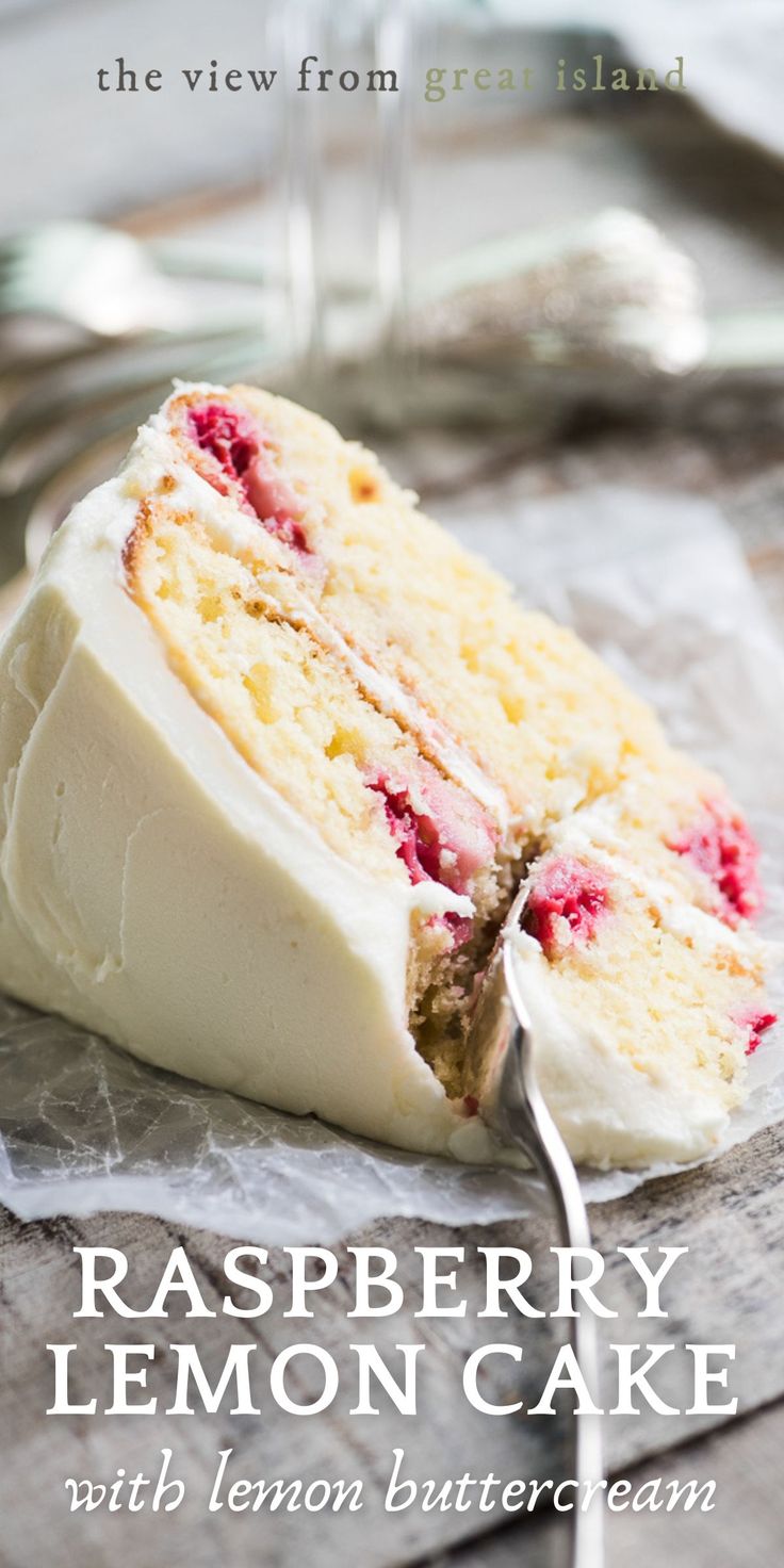 raspberry lemon cake with lemon buttercream is on the table next to a glass of wine