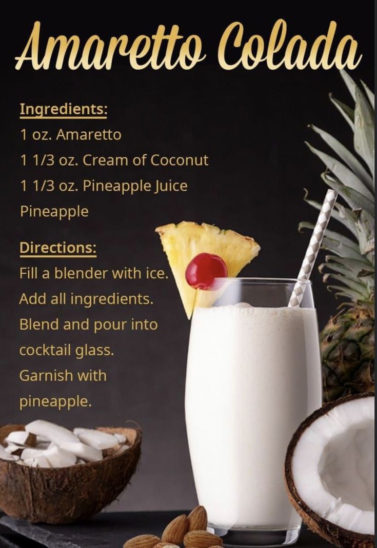 there is a pineapple and coconut drink on the table