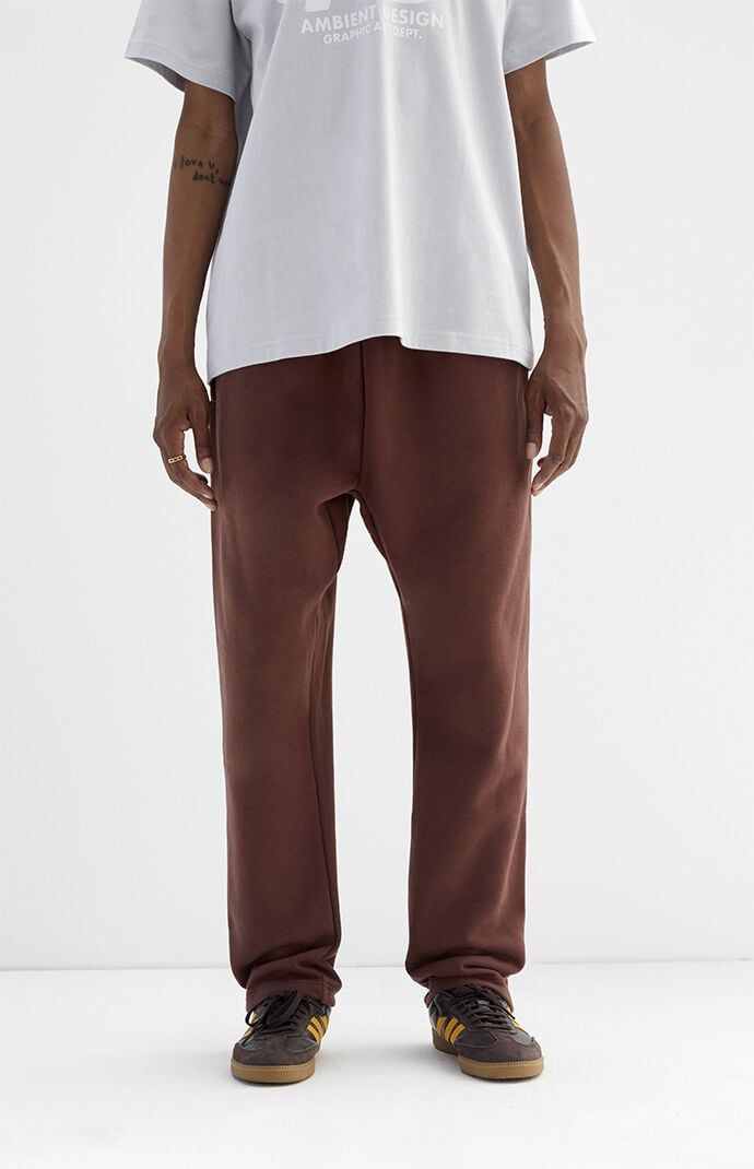 Enjoy casual comfort with PacSun's Straight Leg Sweatpants, designed for easy wear. These sweatpants feature an elasticated waistline and side pockets, complemented by a straight leg cut for a relaxed fit. Crafted from fleece fabrication, they offer warmth and comfort, making them the perfect choice for running errands in style and comfort.Elasticated waistlineSide pocketsStandard fitStraight leg30" Inseam17.5" leg openingStretchy60% Cotton, 40% polyesterMachine washableModel is wearing size mediumModel Measurements: 6'0â Height, 28â Waist, 32â Inseam PacSun Mens Straight Leg Sweatpants - Brown size Medium Comfortable Straight Sweatpants With Pull-on Style, Comfortable Relaxed Fit Sweatpants With Pull-on Style, Comfortable Relaxed Fit Pull-on Sweatpants, Relaxed Fit Solid Sweatpants With Pull-on Style, Cotton Pull-on Sweatpants For Lounging, Relaxed Tapered Leg Sweatpants In Solid Color, Casual Sweatpants With Straight Hem, Relaxed Joggers With Elastic Waistband And Straight Hem, Relaxed Joggers With Elastic Waistband